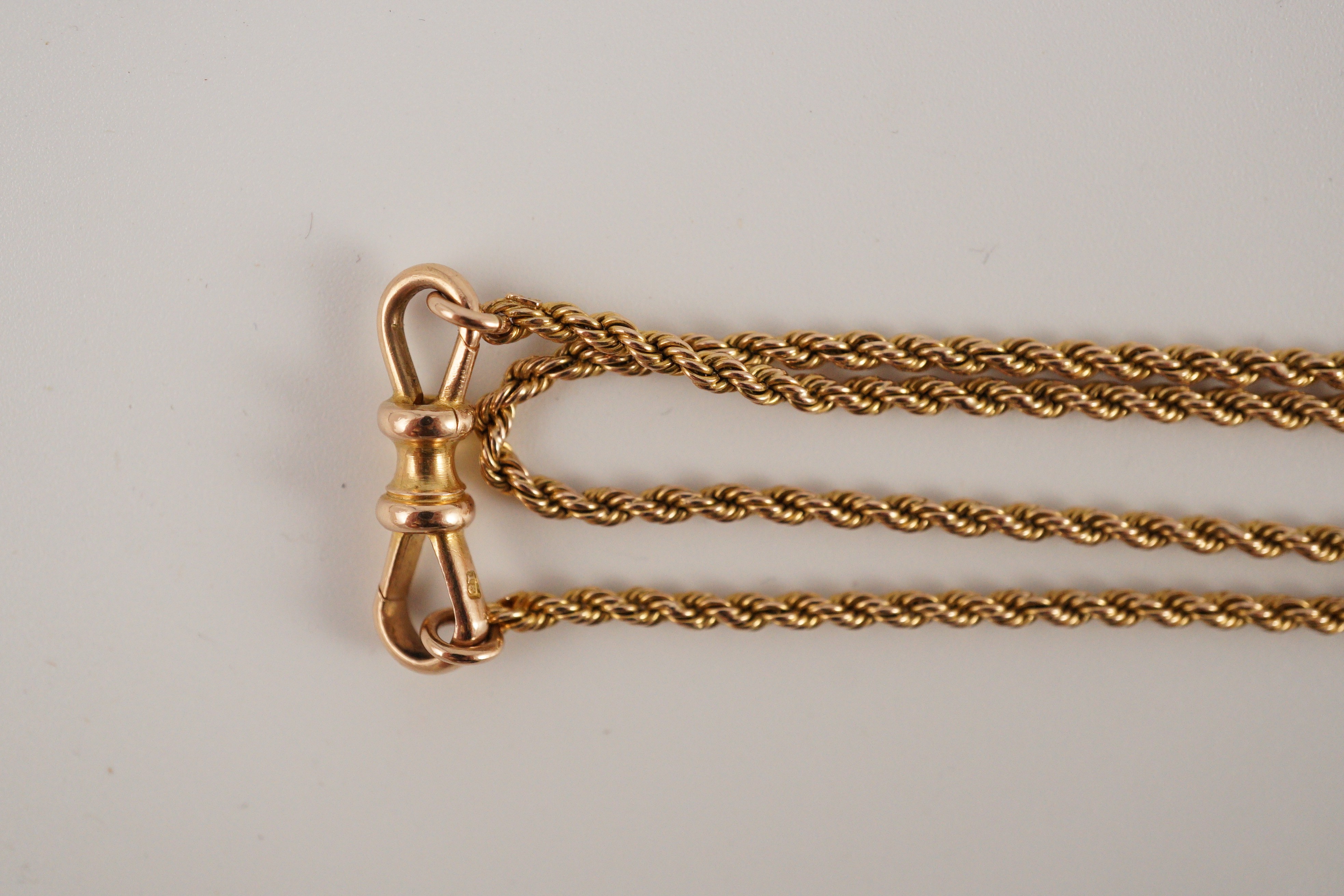 An early 20th century 15ct gold rope twist guard chain